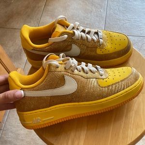 Nike Women’s yellow/gold Air Force 1s
